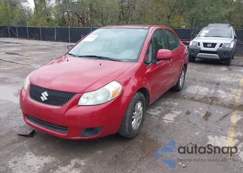 2012 Suzuki Sx4 Le/Le Popular из США, поврежденный, VIN JS2YC5A30C6303383